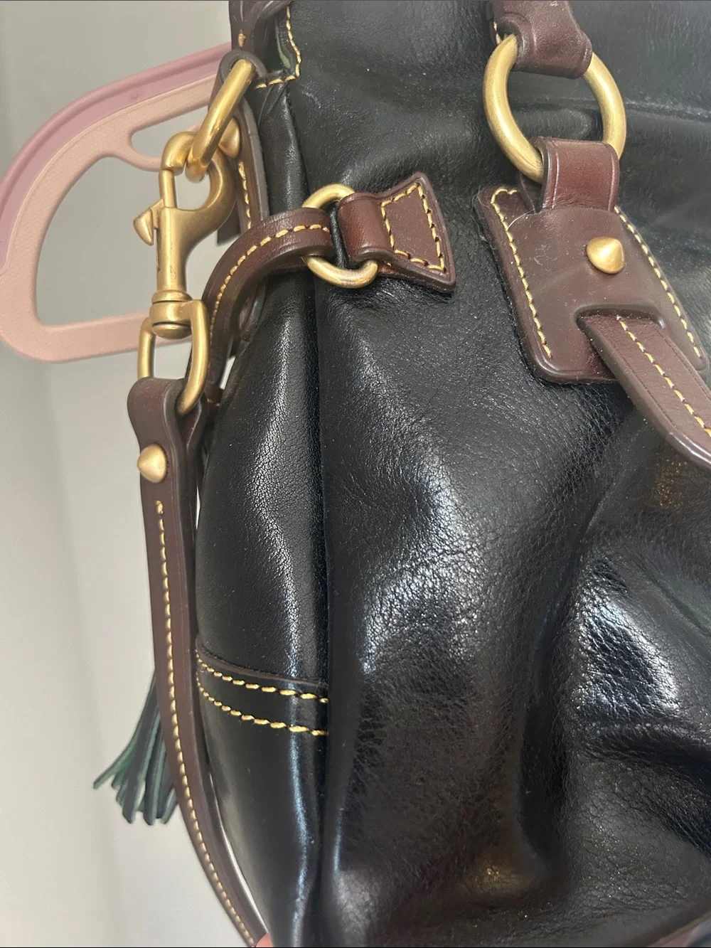 Dooney & Bourke Black Leather Satchel with Brown Trim and Gold Hardware